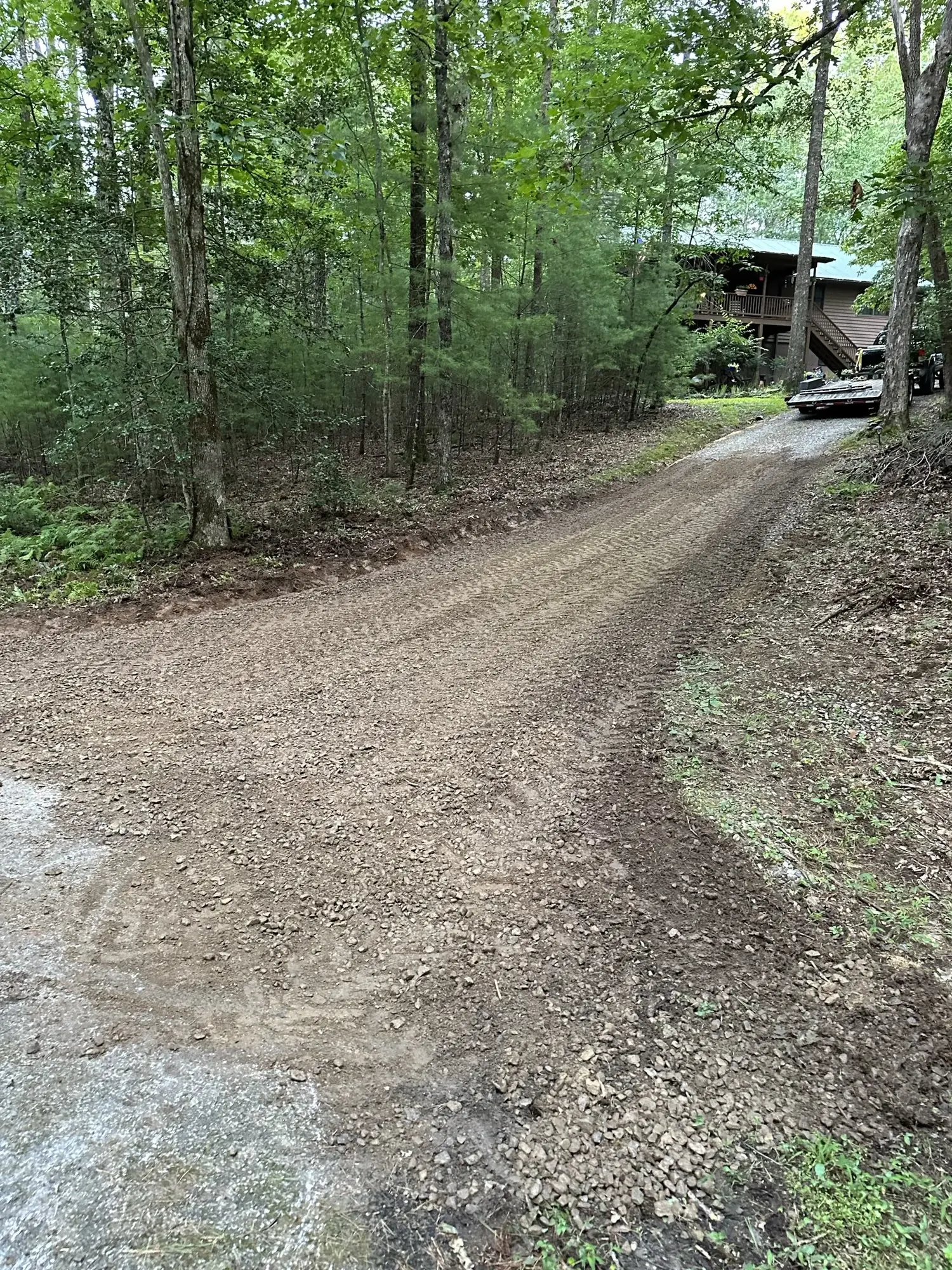After - Wooded driveway with clean finished access to the home