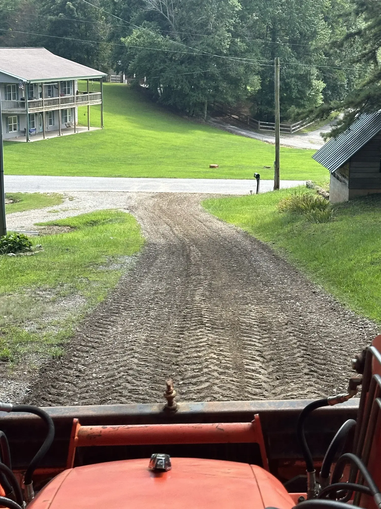 Excavator shaping the site